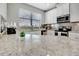 Modern kitchen with stainless steel appliances and granite countertops at 228 Crew Ct, Sarasota, FL 34243