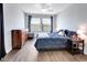 Bedroom with dark blue bedding and a cat-themed décor at 228 Crew Ct, Sarasota, FL 34243