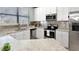 Modern kitchen with stainless steel appliances and granite countertops at 228 Crew Ct, Sarasota, FL 34243