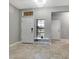 Bright and airy entryway with tile flooring and a small console table at 228 Crew Ct, Sarasota, FL 34243