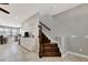 Modern staircase with dark wood and metal railing at 228 Crew Ct, Sarasota, FL 34243