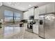 Modern kitchen with stainless steel appliances and granite countertops at 228 Crew Ct, Sarasota, FL 34243