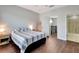 Bright bedroom with a comfortable bed and en-suite bathroom access at 228 Crew Ct, Sarasota, FL 34243