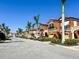 Luxury townhouses with Spanish tile roofs, lush landscaping, and convenient location at 228 Crew Ct, Sarasota, FL 34243