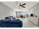 Open living space with a navy sofa and views to the kitchen at 228 Crew Ct, Sarasota, FL 34243