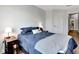 Charming bedroom with dark blue bedding and Mickey Mouse toy at 228 Crew Ct, Sarasota, FL 34243