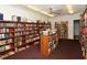 Well-stocked community library with numerous bookshelves at 2020 Riverbluff Pkwy # V329, Sarasota, FL 34231
