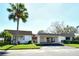 Condo exterior, carport, palm tree at 2020 Riverbluff Pkwy # V329, Sarasota, FL 34231
