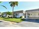 Condo exterior, carport, palm tree at 2020 Riverbluff Pkwy # V329, Sarasota, FL 34231