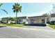 Condo exterior, carport, palm tree at 2020 Riverbluff Pkwy # V329, Sarasota, FL 34231