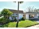 Condo exterior, carport, palm tree at 2020 Riverbluff Pkwy # V329, Sarasota, FL 34231