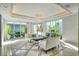 Elegant lobby with comfortable seating, large windows, and high ceilings at 10520 Boardwalk Loop # 301, Bradenton, FL 34202