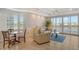 Spacious living room with water views and seating area at 10520 Boardwalk Loop # 301, Bradenton, FL 34202