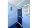 Front door of a condo unit with screen door at 2850 Gulf Of Mexico Dr # 2, Longboat Key, FL 34228