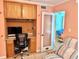 Home office with built-in desk and comfortable chair at 2850 Gulf Of Mexico Dr # 2, Longboat Key, FL 34228