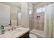 This simple bathroom features a single sink vanity and a shower-tub combination at 1111 143Rd Ne St, Bradenton, FL 34212