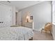 Bedroom with double bed, rattan chair, and dresser at 1111 143Rd Ne St, Bradenton, FL 34212
