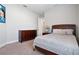 Bright bedroom with double bed, dresser, and window at 1111 143Rd Ne St, Bradenton, FL 34212