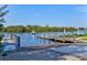 Picturesque boat ramp with docks on a calm river, perfect for launching your boat and enjoying the water at 1111 143Rd Ne St, Bradenton, FL 34212