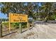 Fort Hamer Manatee County Boat Ramp sign surrounded by mature trees at 1111 143Rd Ne St, Bradenton, FL 34212