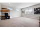 Large bonus room with neutral paint and carpet, plus contemporary wall art at 1111 143Rd Ne St, Bradenton, FL 34212