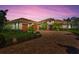 Luxury home with three-car garage, paver driveway and professionally landscaped yard at 1111 143Rd Ne St, Bradenton, FL 34212