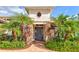 Elegant front entry with stone accents and a double door at 1111 143Rd Ne St, Bradenton, FL 34212