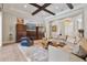 Spacious living room showcasing built-in cabinetry and hardwood floors at 1111 143Rd Ne St, Bradenton, FL 34212