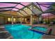 A covered lanai overlooking a stunning pool and spa provides the perfect spot for relaxing or entertaining at 1111 143Rd Ne St, Bradenton, FL 34212
