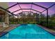 Relaxing screened pool and spa with plenty of space for lounging and entertaining at 1111 143Rd Ne St, Bradenton, FL 34212