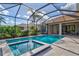 Inviting pool and spa with screened enclosure at 1111 143Rd Ne St, Bradenton, FL 34212