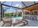 Relaxing pool and spa area with covered patio at 1111 143Rd Ne St, Bradenton, FL 34212