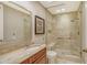 Modern bathroom featuring a large shower with a glass door and a stylish vanity at 1233 N Gulfstream Ave # 1001, Sarasota, FL 34236