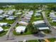 Aerial view of a mobile home community, showcasing the property's location and surrounding area at 6421 Kilohee Ct, North Port, FL 34287