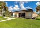 Community building with ample parking and landscaping at 6421 Kilohee Ct, North Port, FL 34287