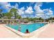Refreshing community pool with plenty of space for swimming and relaxing at 6421 Kilohee Ct, North Port, FL 34287