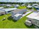 Mobile home with shed and golf cart in a quiet community at 6421 Kilohee Ct, North Port, FL 34287