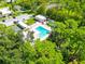 Aerial view of community pool and surrounding area at 6421 Kilohee Ct, North Port, FL 34287