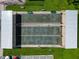 Shuffleboard courts with covered areas and benches at 6421 Kilohee Ct, North Port, FL 34287