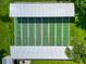 Well-maintained shuffleboard courts with covered seating areas at 6421 Kilohee Ct, North Port, FL 34287