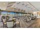 Bright and airy dining room with large windows and patterned carpet at 4210 Caddie E Dr # 102, Bradenton, FL 34203