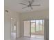 Bright living room with sliding glass doors to a screened patio at 4210 Caddie E Dr # 102, Bradenton, FL 34203