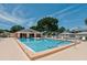 Relaxing rectangular pool with a separate spa area at 4210 Caddie E Dr # 102, Bradenton, FL 34203