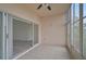 Enclosed patio with tiled flooring and access to living room at 4210 Caddie E Dr # 102, Bradenton, FL 34203