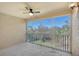 Screened balcony overlooking a wooded area at 7131 Boca Grove Pl # 202, Lakewood Ranch, FL 34202