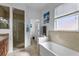 Bathroom with shower, bathtub, and double vanity at 15912 Melport Cir, Port Charlotte, FL 33981