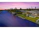 Aerial view of canal front home with private dock at 15912 Melport Cir, Port Charlotte, FL 33981