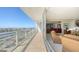 Private balcony showcasing stunning water views and access to interior living space at 1233 N Gulfstream Ave # 1001, Sarasota, FL 34236