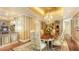 Formal dining room features hardwood floors and striped wallpaper at 1233 N Gulfstream Ave # 1001, Sarasota, FL 34236