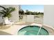 Relaxing hot tub with seating area and city views at 1233 N Gulfstream Ave # 1001, Sarasota, FL 34236